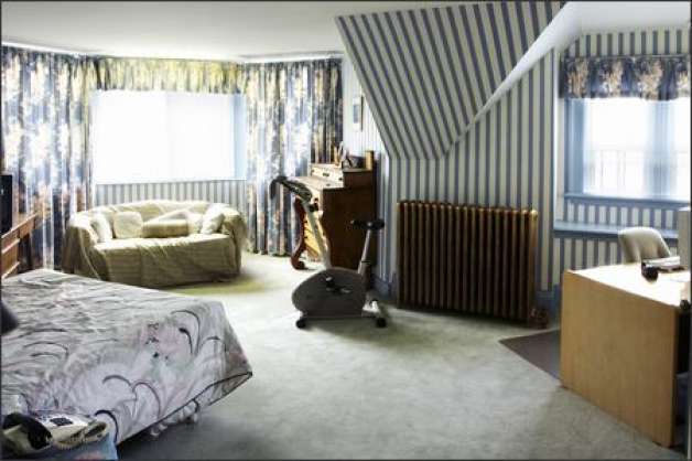 Before Hypnotic striped wallpaper made the rooms angles more awkward