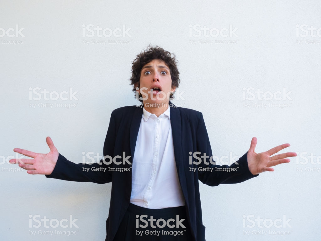 Stressed Businesswoman Shocked With News Stock Photo