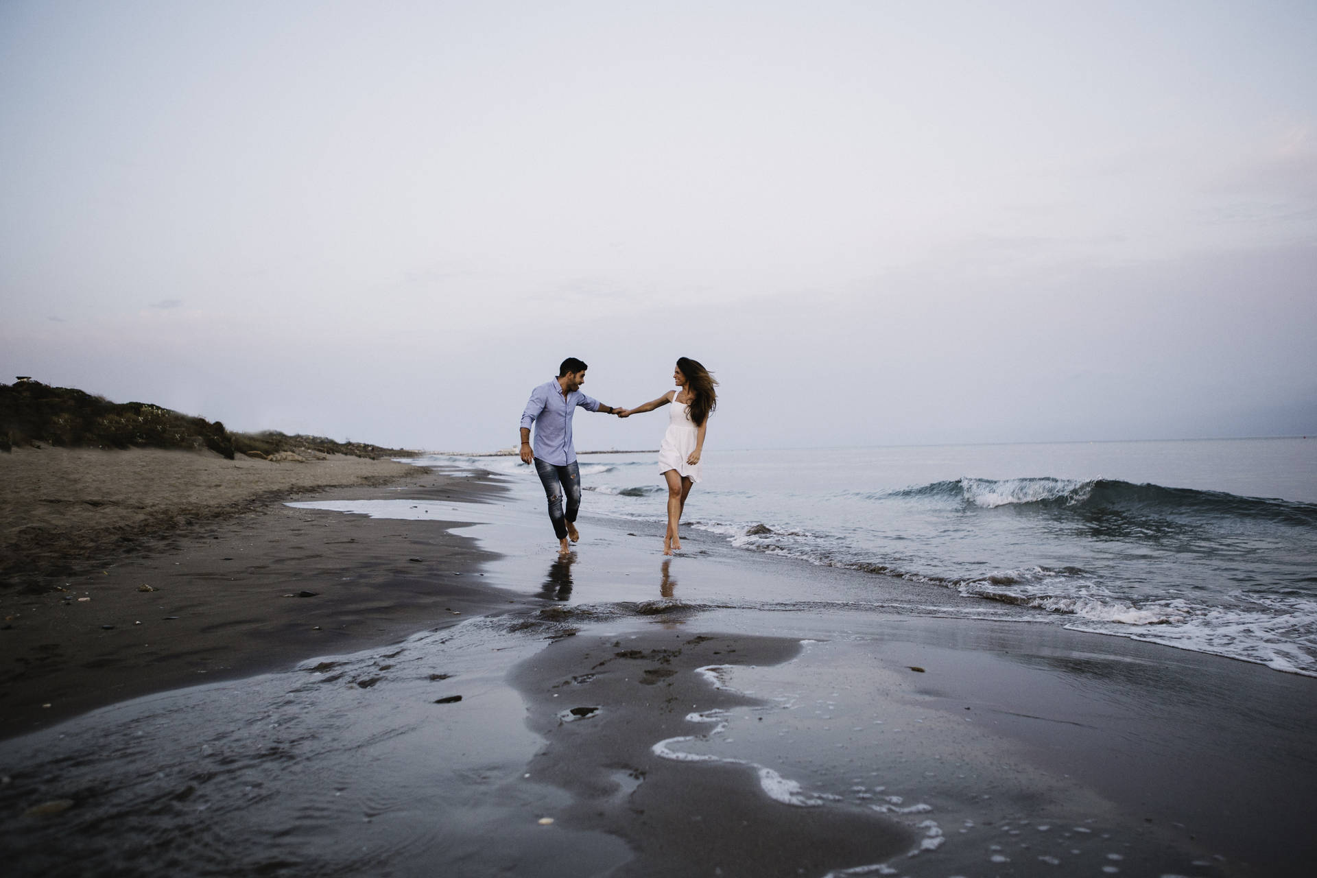 Couple At The Beach Wallpaper