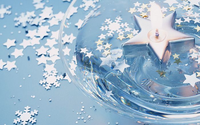 Floating Candle With Silver Stars And Snowflake Confetti Picture