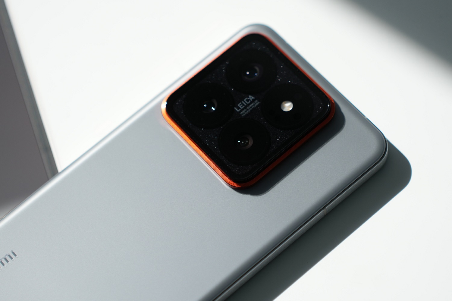Close-up of the Xiaomi 14 Pro's camera module, showcasing the Leica branding and quad-camera setup