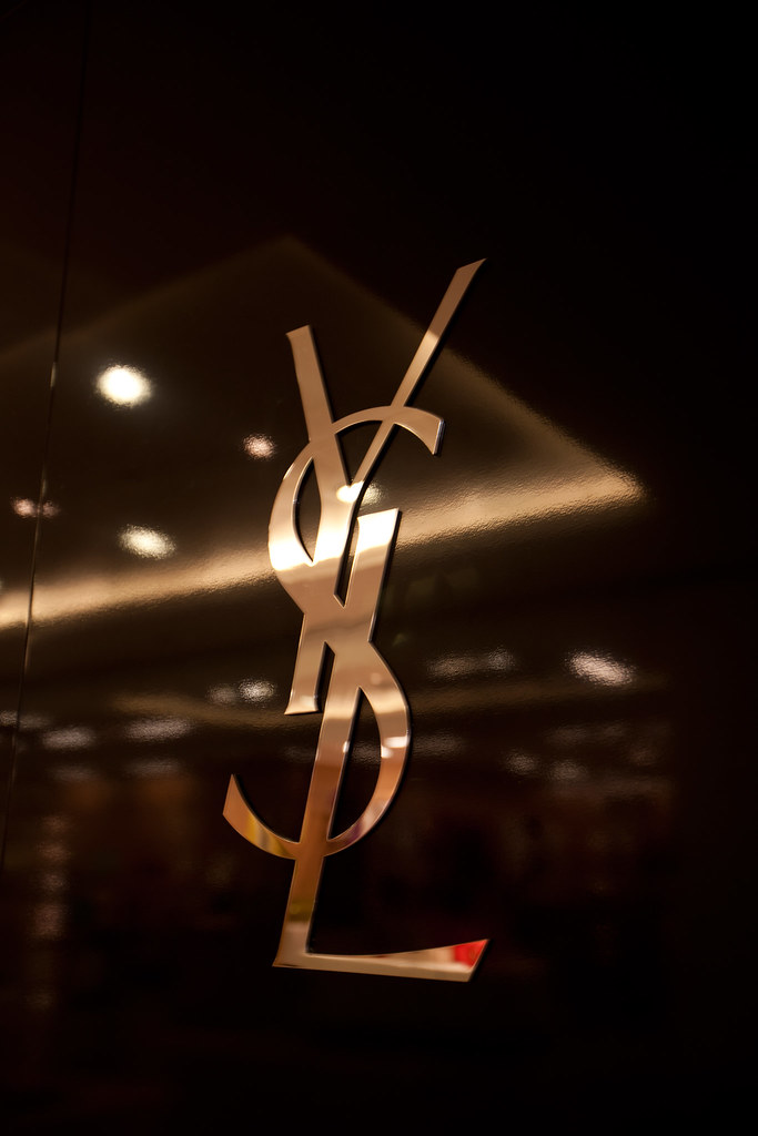 Yves Saint Laurent Logo Taken In Front Of A Lau