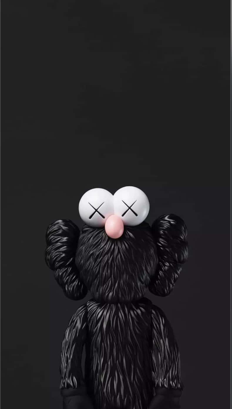 A Black Stuffed Animal With Face Wallpaper