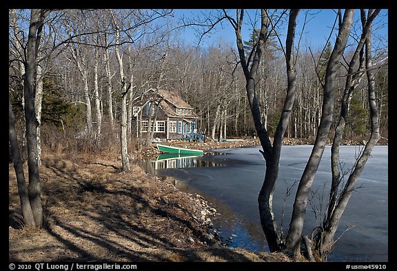 PicturePhoto Lake forest and house in late winter Maine USA