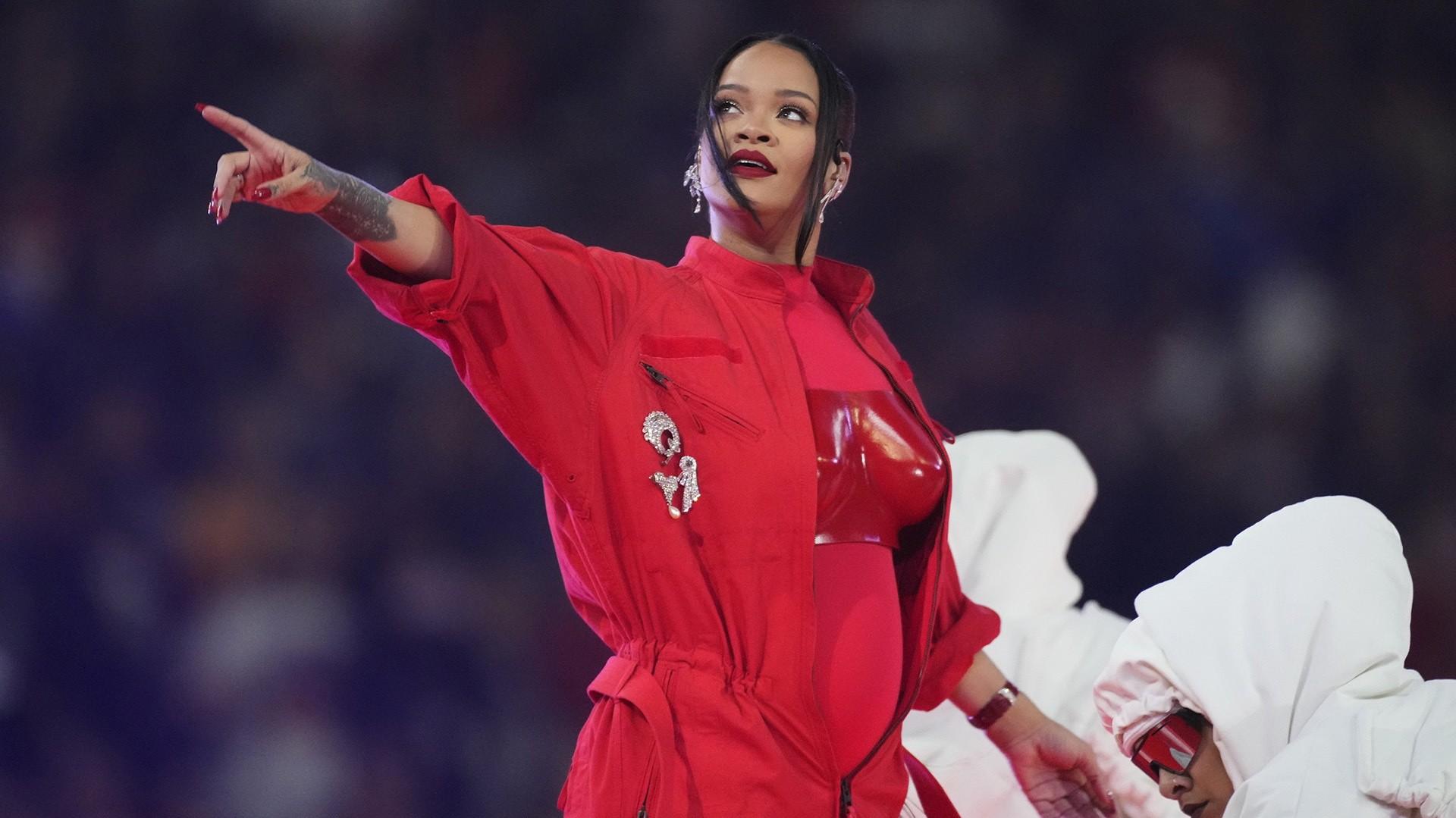 Rihanna reveals baby bump during Super Bowl halftime show