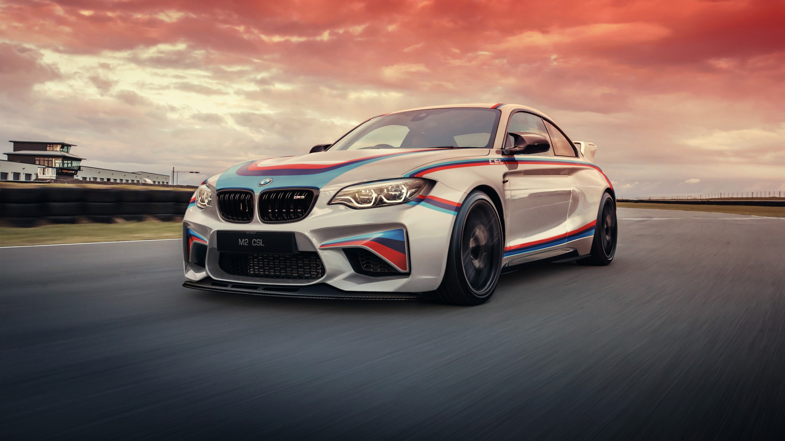 BMW M2 CSL racing on a track