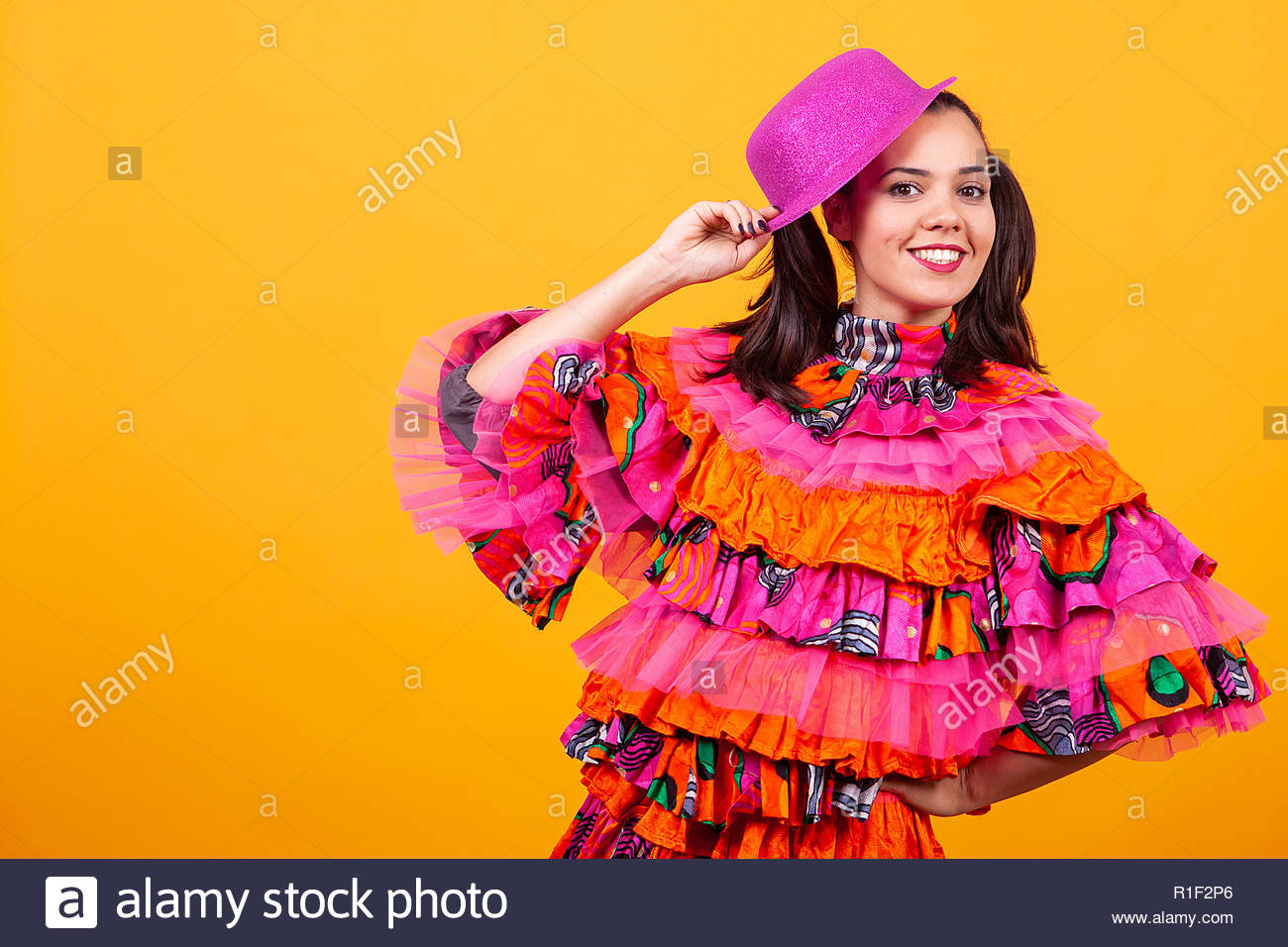 Young Beautiful Woman Wearing A Mascarade Latino Costume Over