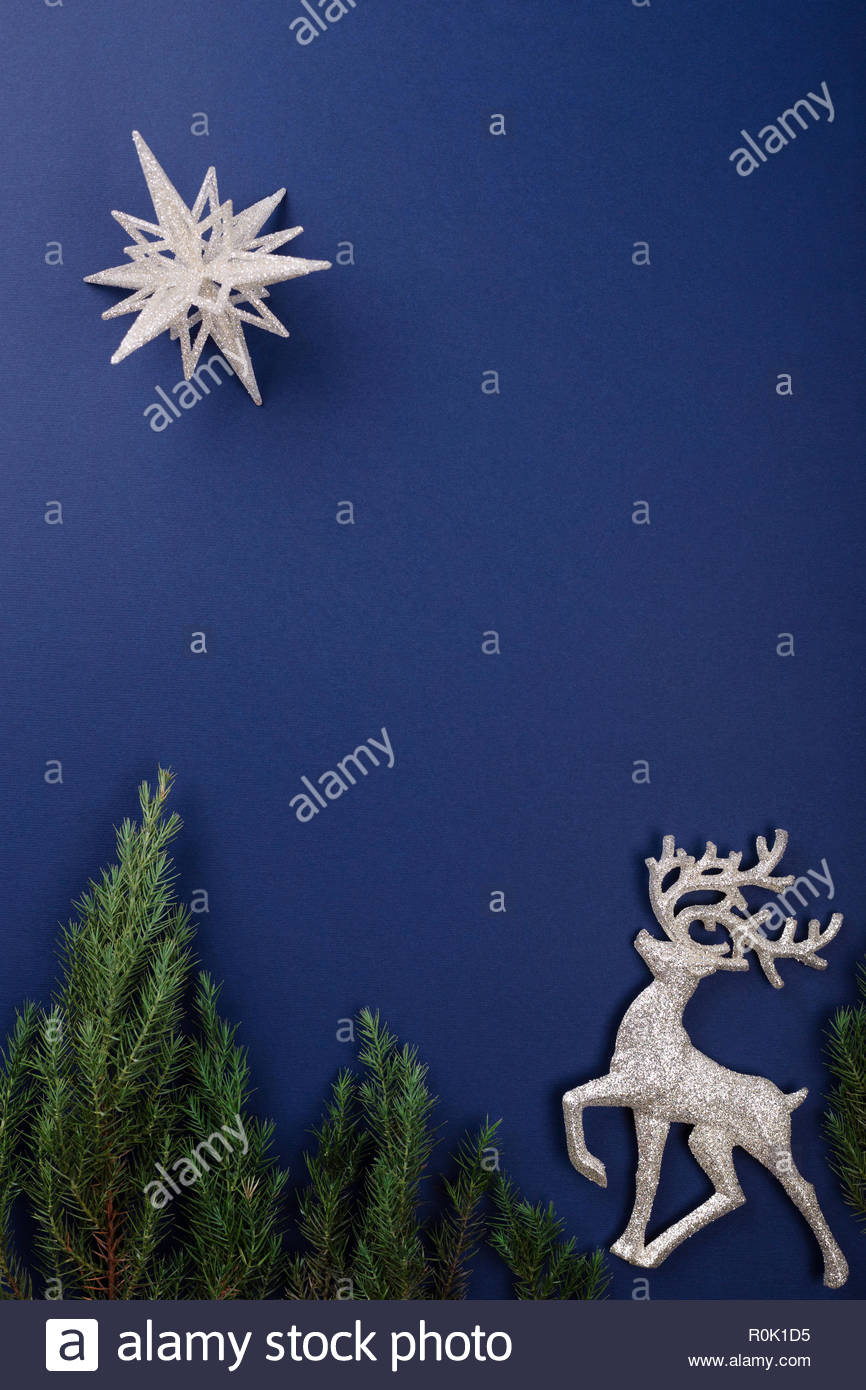 Christmas Scene Made Of Silver Figurines Reindeer And Star On