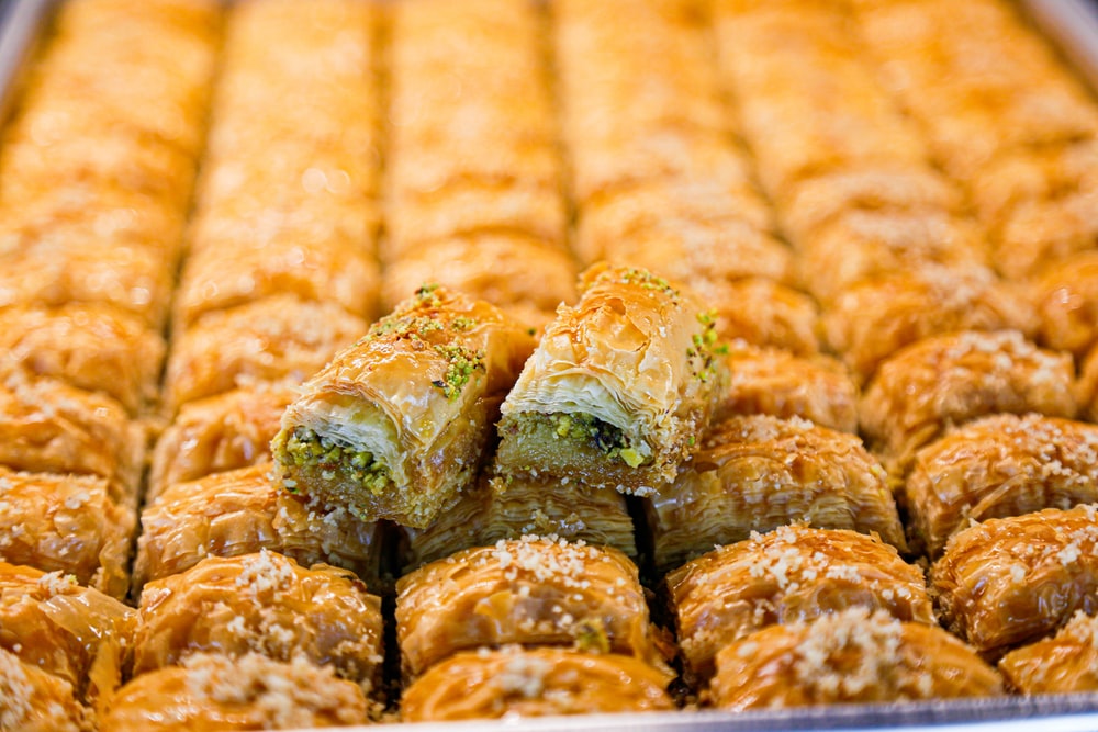 Brown And Green Bread With Leaves Photo Baklava Image
