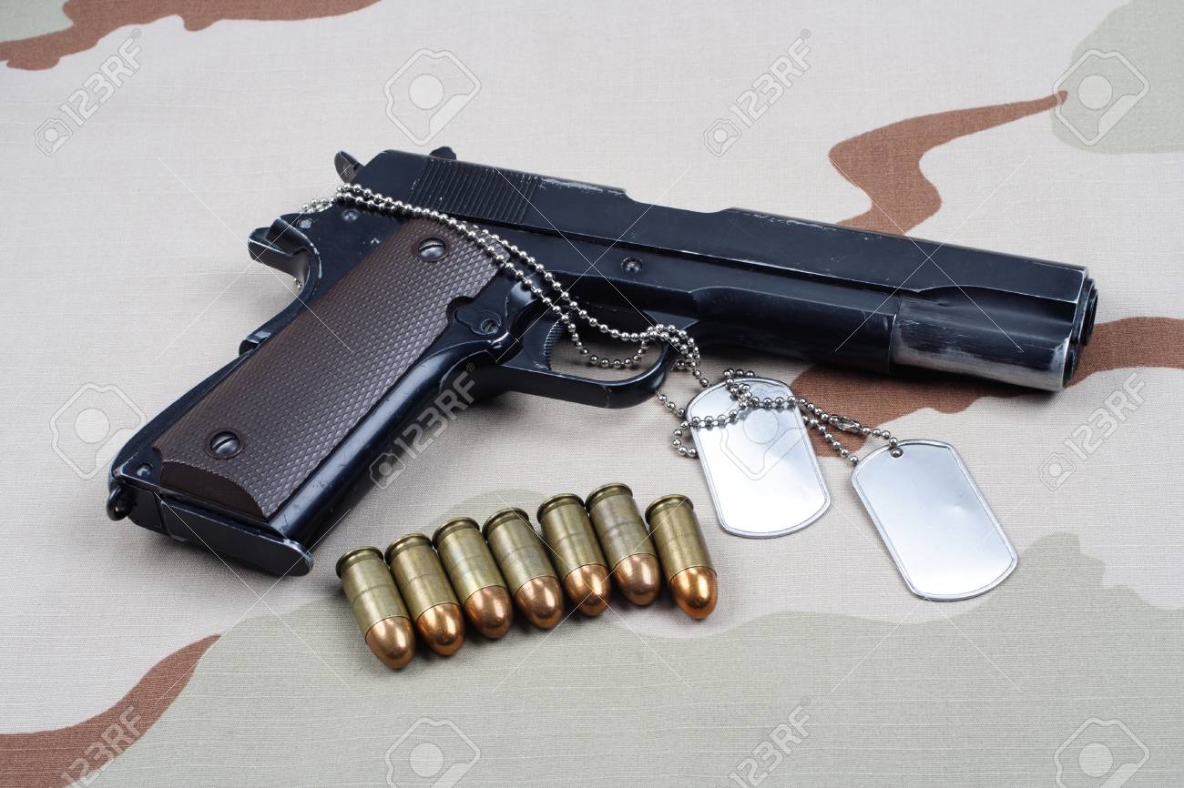 Colt Government With U S Army Uniform Background Stock Photo