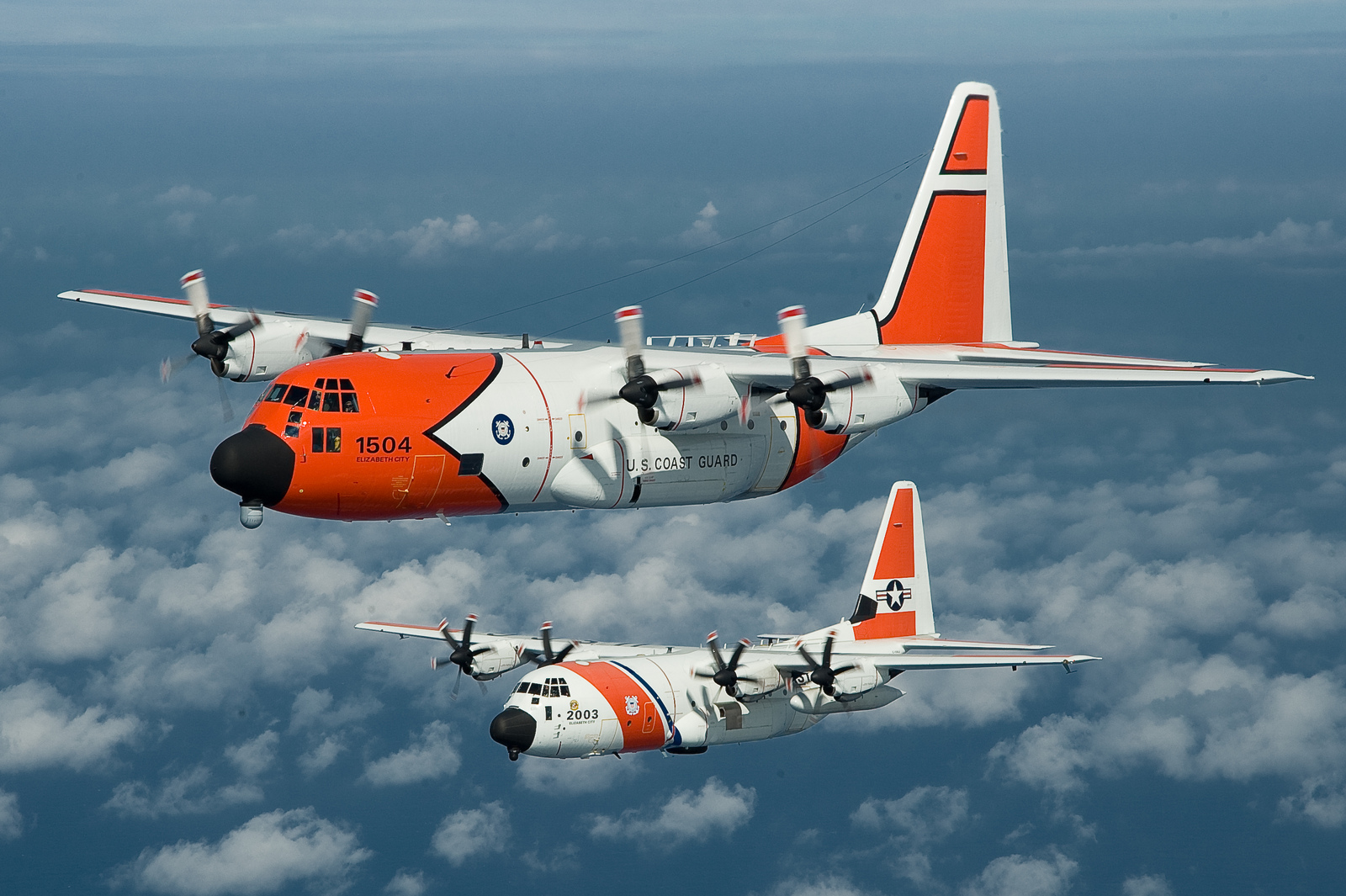 In Coast Guard Service Flies Formation With A New Hc 130j Bottom