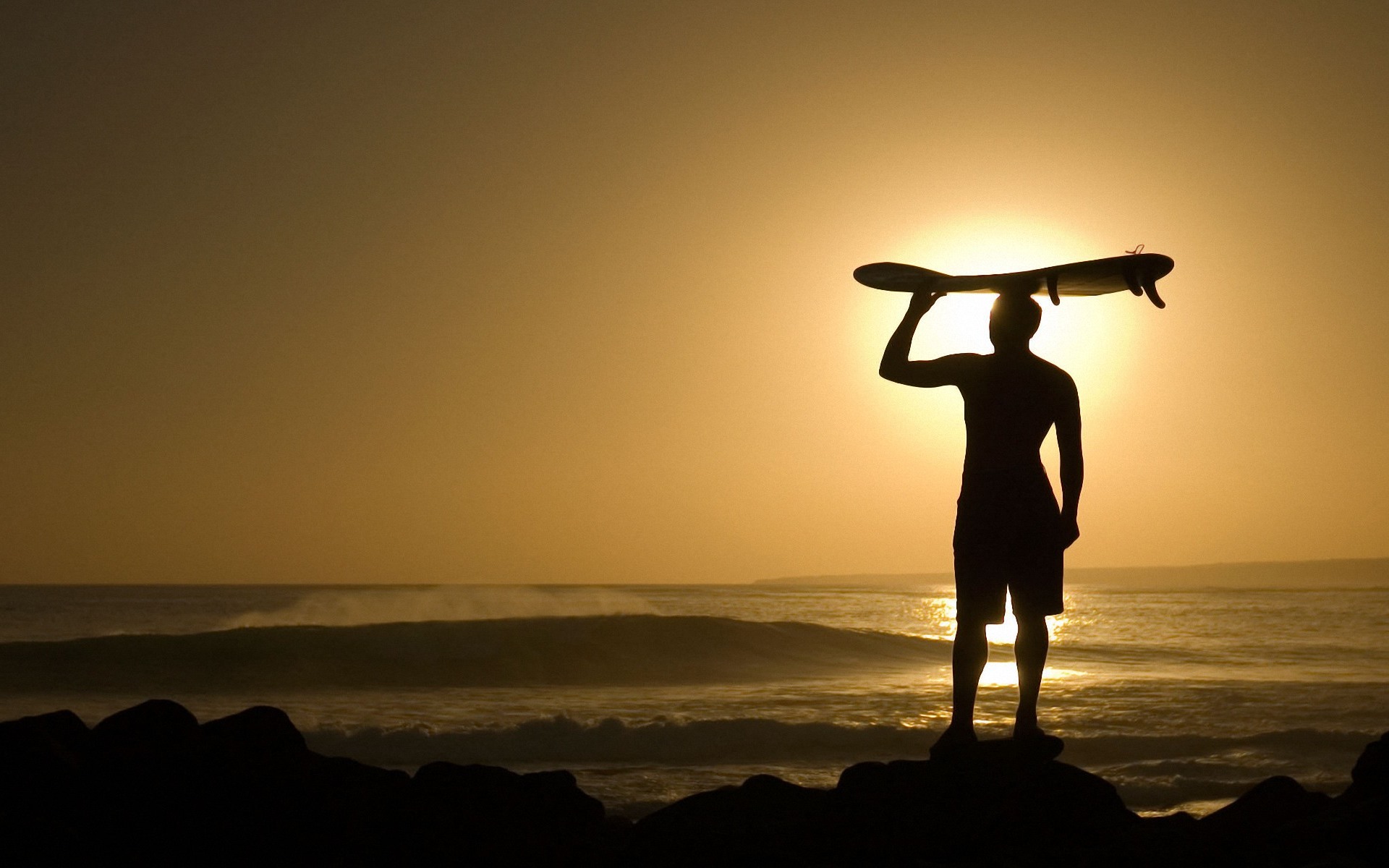 Surfing At Sunset Wallpaper