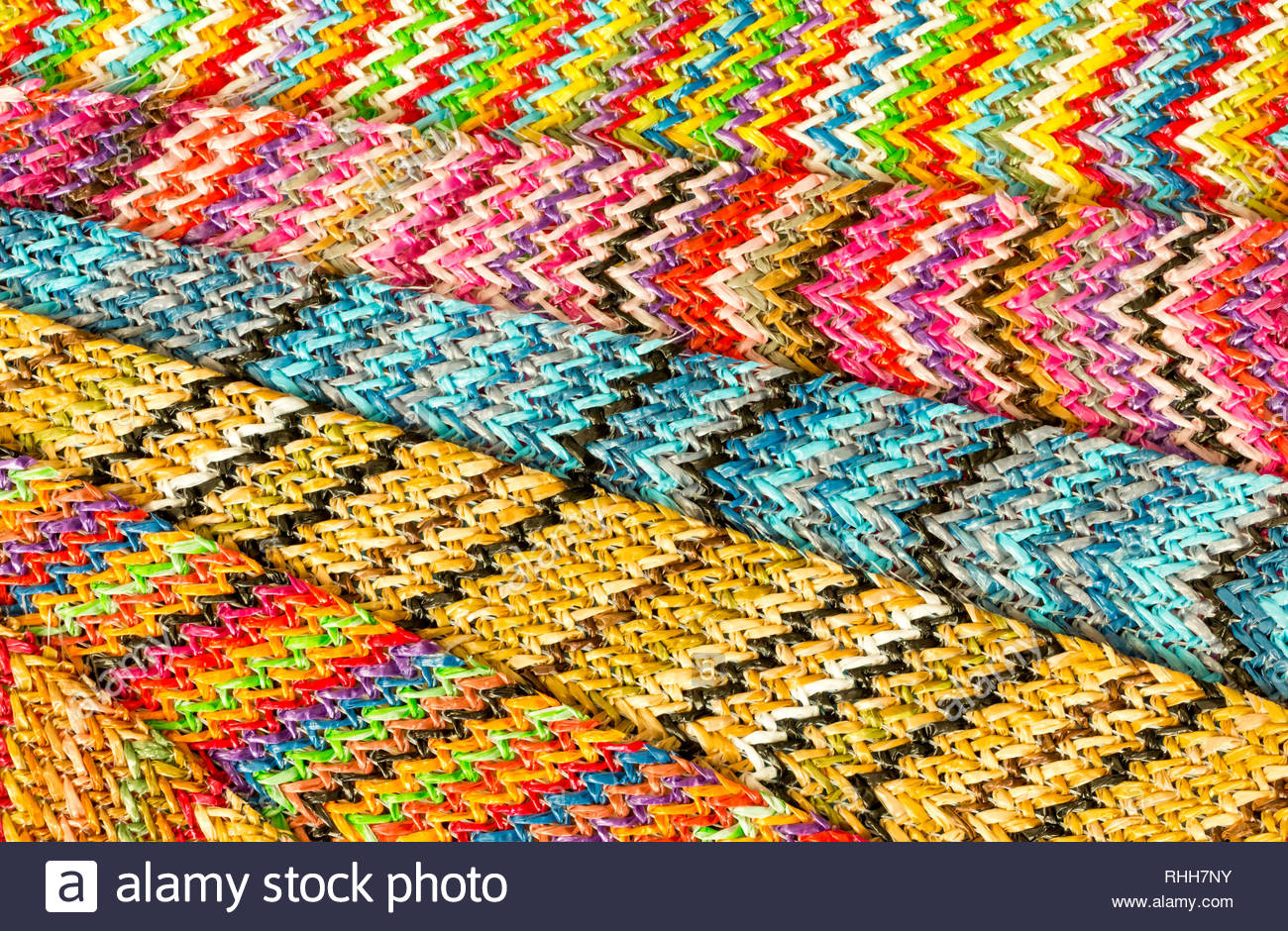 An Abstract Textured Background Design Of Multicolored Zigzag