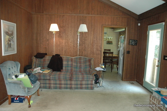  ROOM AFTER You can either remove the wood paneling or paint over it