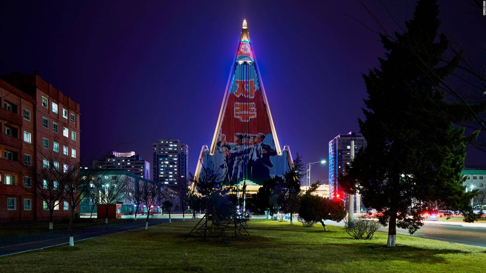 Ryugyong Hotel Illuminated At Night In Pyongyang North Korea Wallpaper