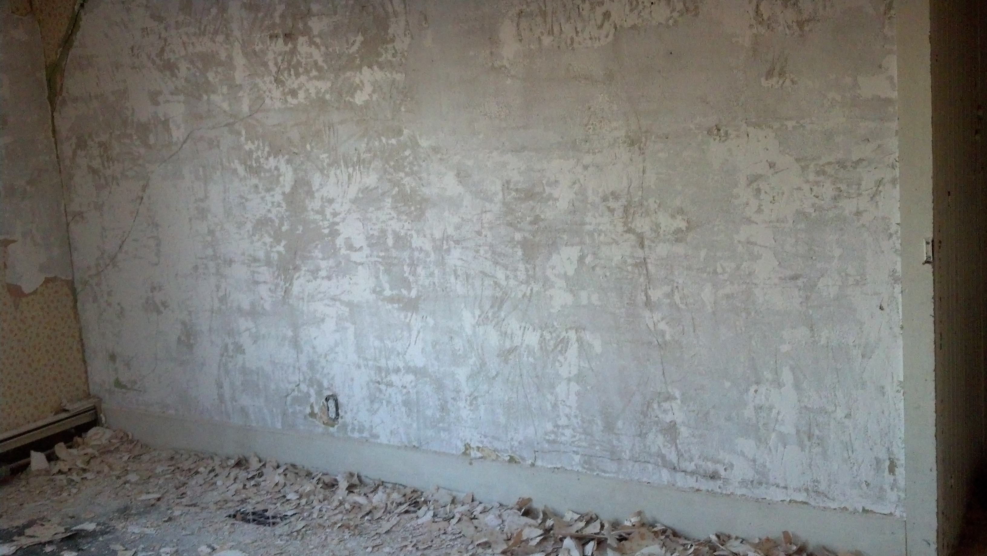 wallpaper and a layer of skim coat