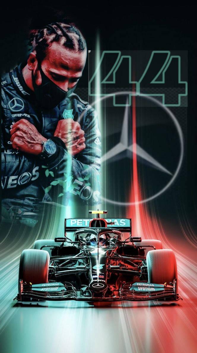Iconic Snapshot Of Lewis Hamilton In Action Wallpaper