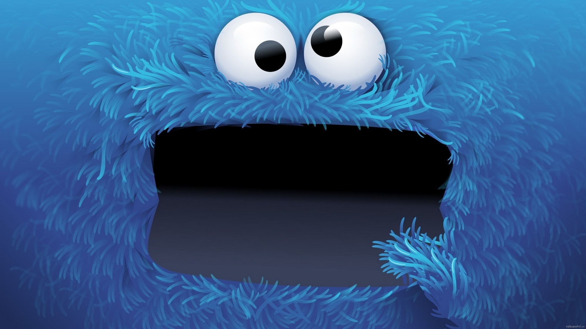 Close-up of Cookie Monster with open mouth, ideal for a fun and quirky laptop wallpaper