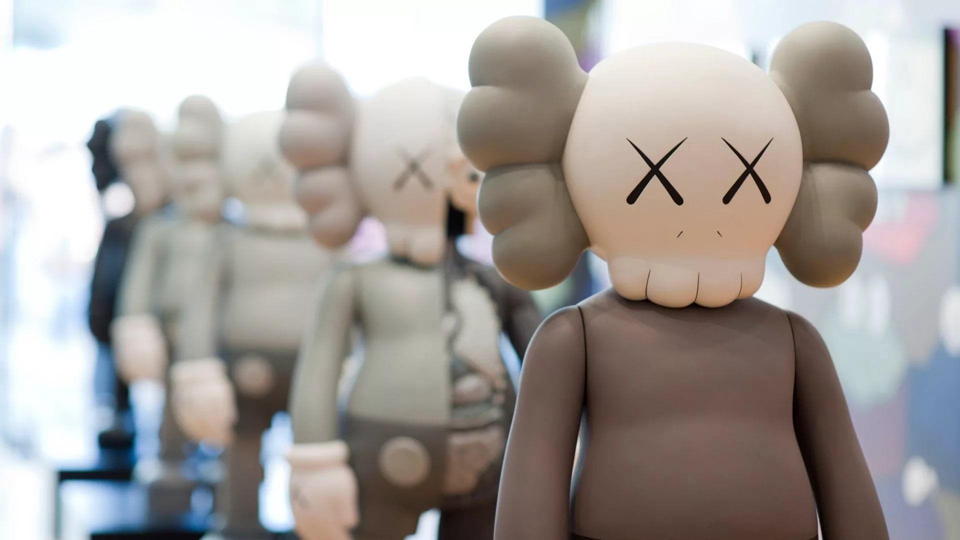 KAWS Companion figure in a store display, showcasing its iconic design and collectible nature