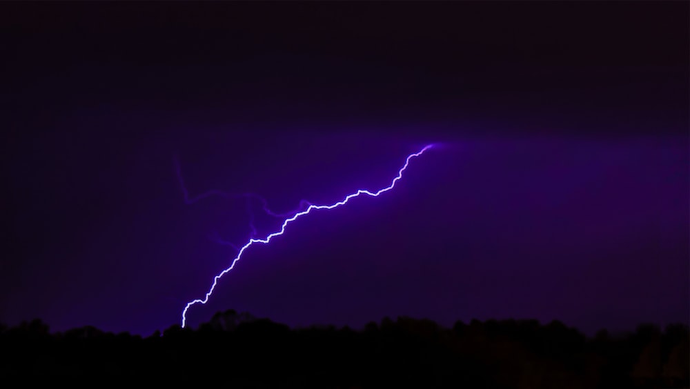 Lightning Striking Mountain Photo Image