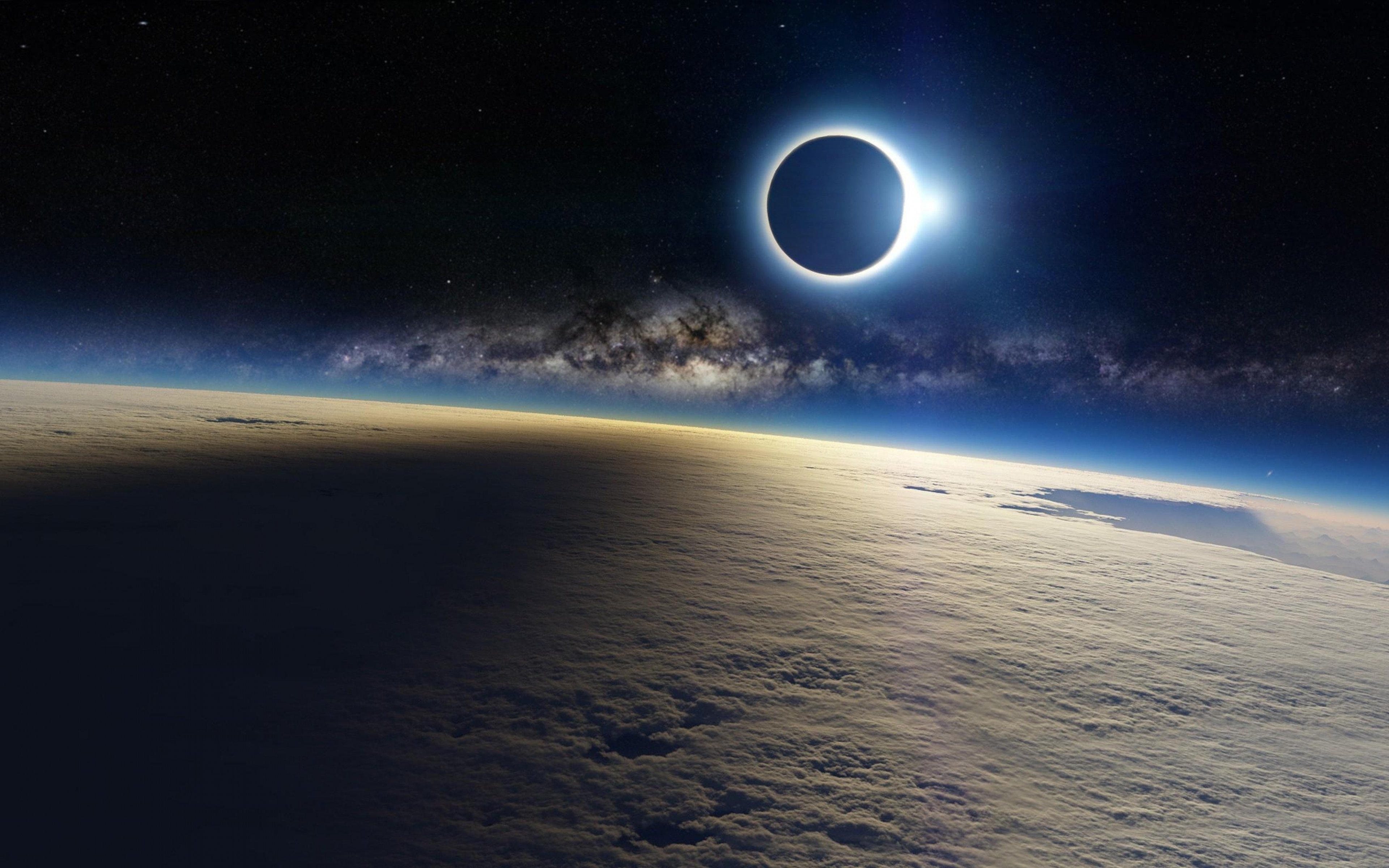 Download HD Solar Eclipse Moon Shadow On Earth Cloud Wallpaper 3840x2400