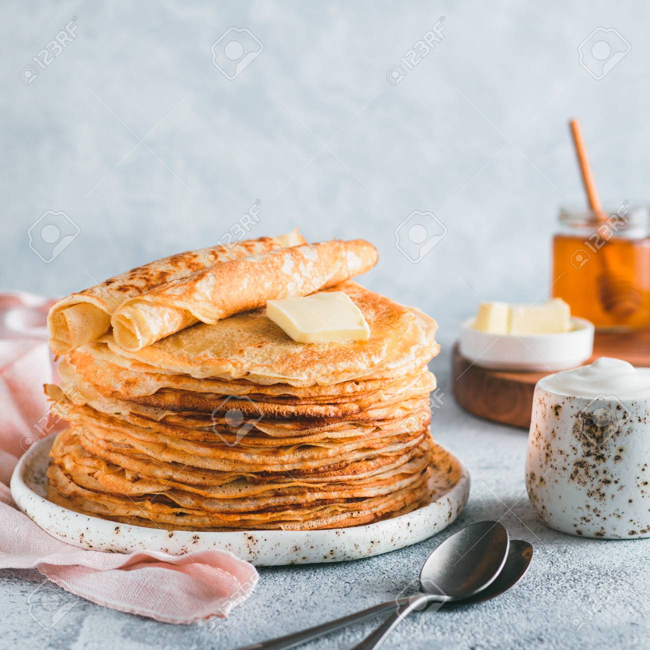 Stack Of Traditional Russian Pancakes Blini On Gray Background