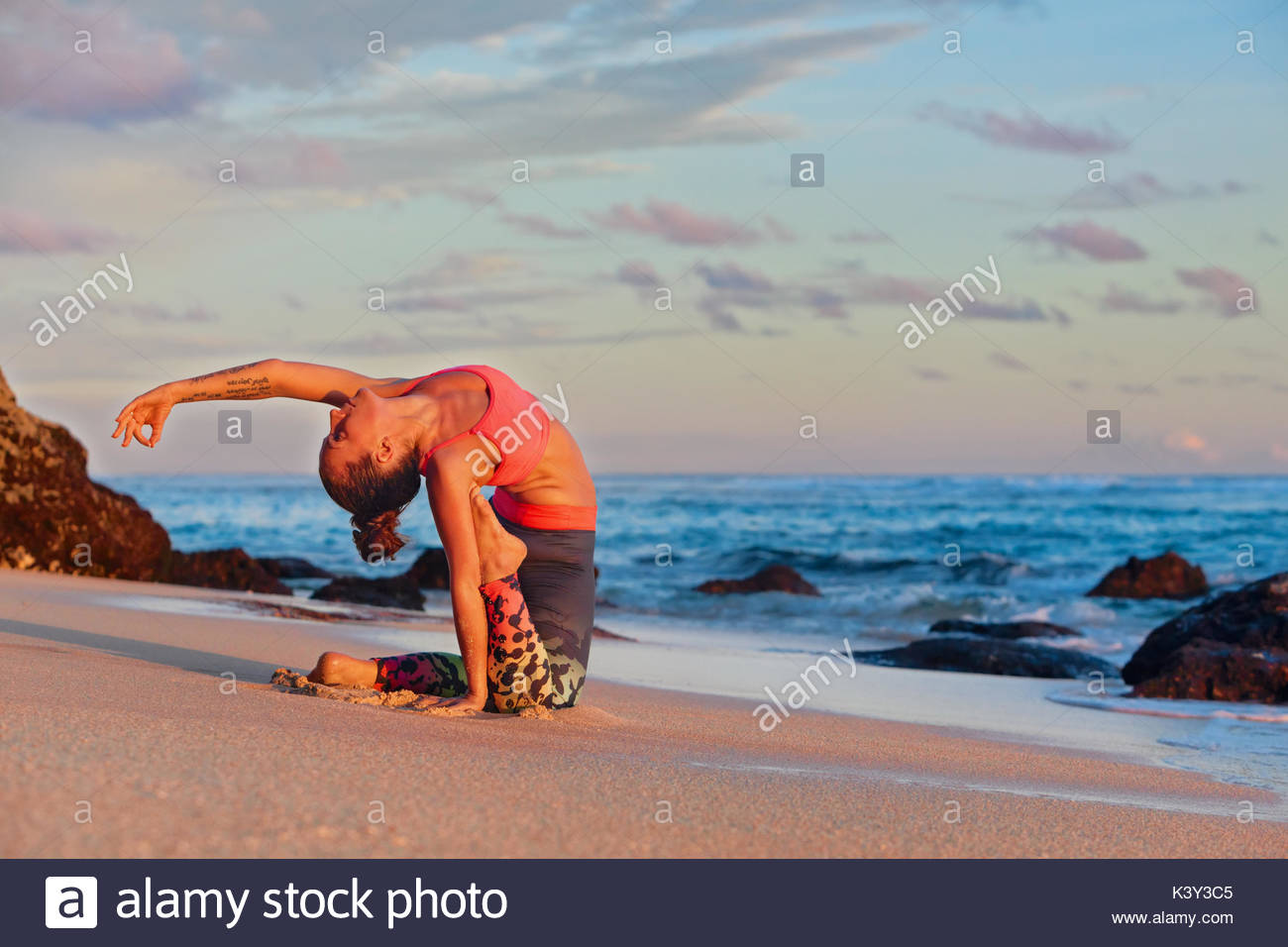Meditation On Sunset Sky Background Young Active Woman Sit In