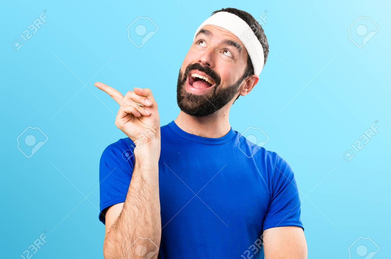 Funny Sportsman Thinking On Colorful Background Stock Photo