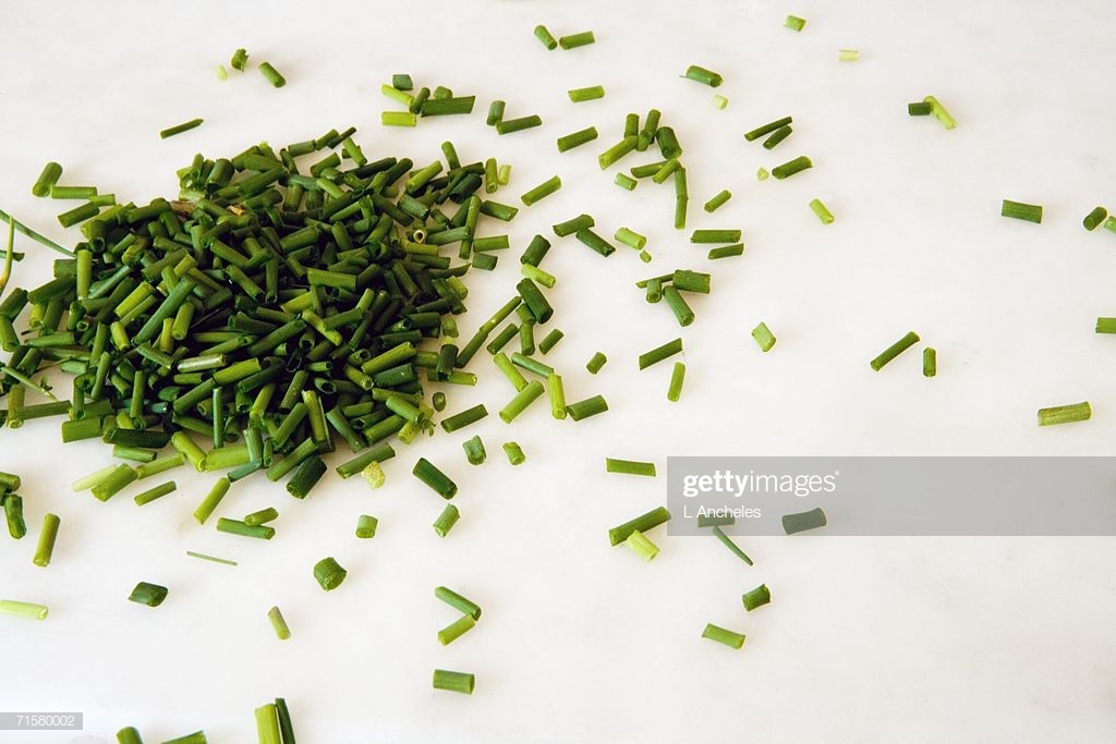 Chopped Chives On A White Background Stock Photo Getty Image