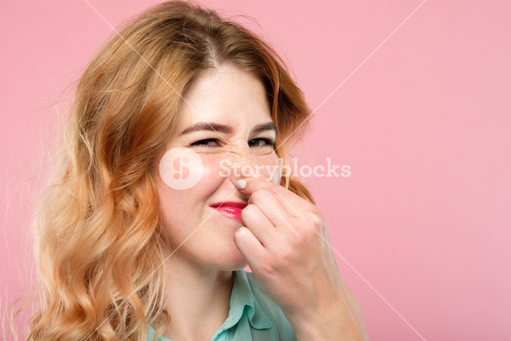 Bad Rancid Smell Or Terrible Odor Concept Woman Holding Her Nose