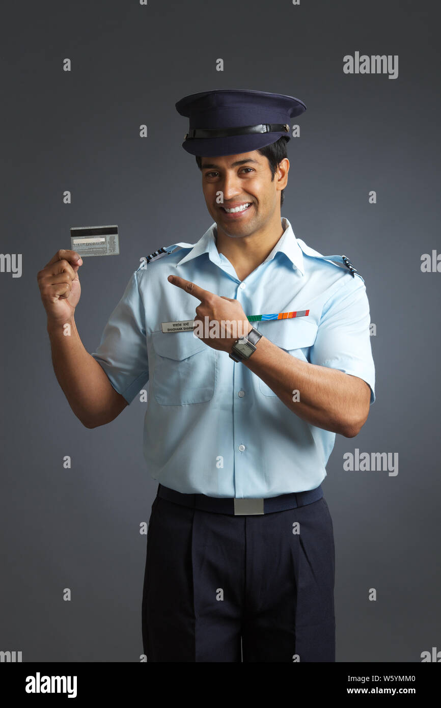 Airforce pilot showing a credit card smiling Stock Photo   Alamy
