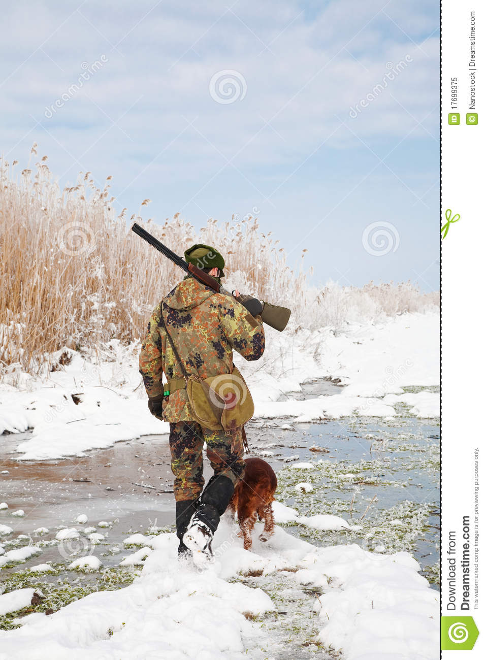 Stock Photo Hunter With His Hunting Dog During A Winter Hunt