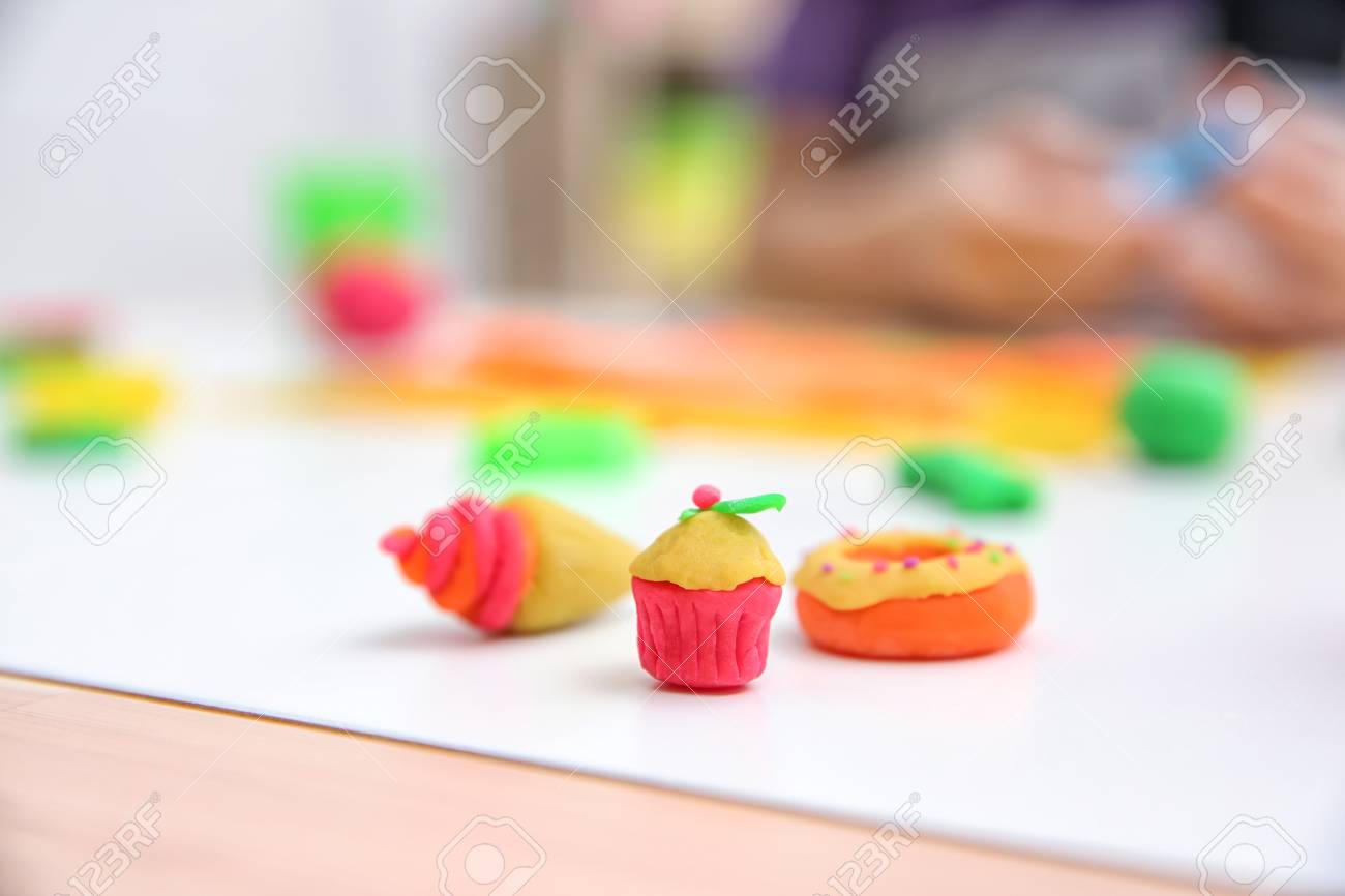 Cupcake Made From Playdough On Table Against Blurred Background