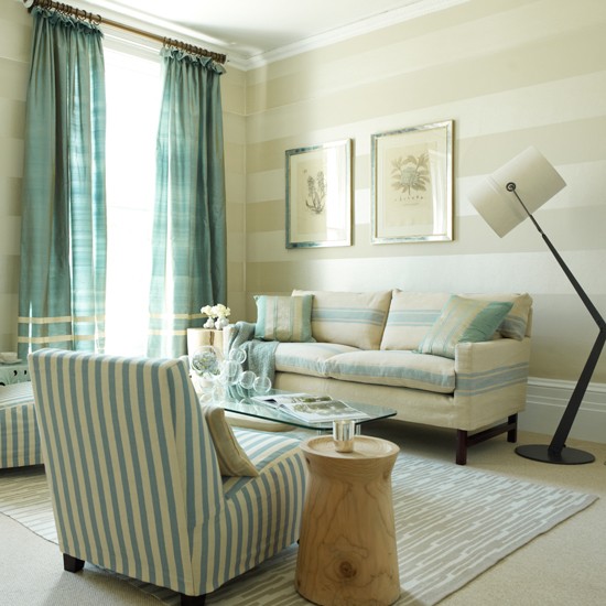 Living Room With Striped Wallpaper Sofas And Teal