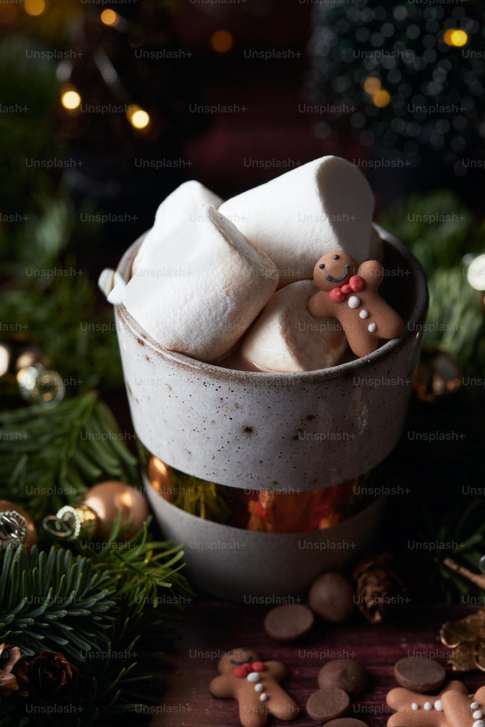 A Cup Filled With Marshmallows On Top Of Table Photo Christmas