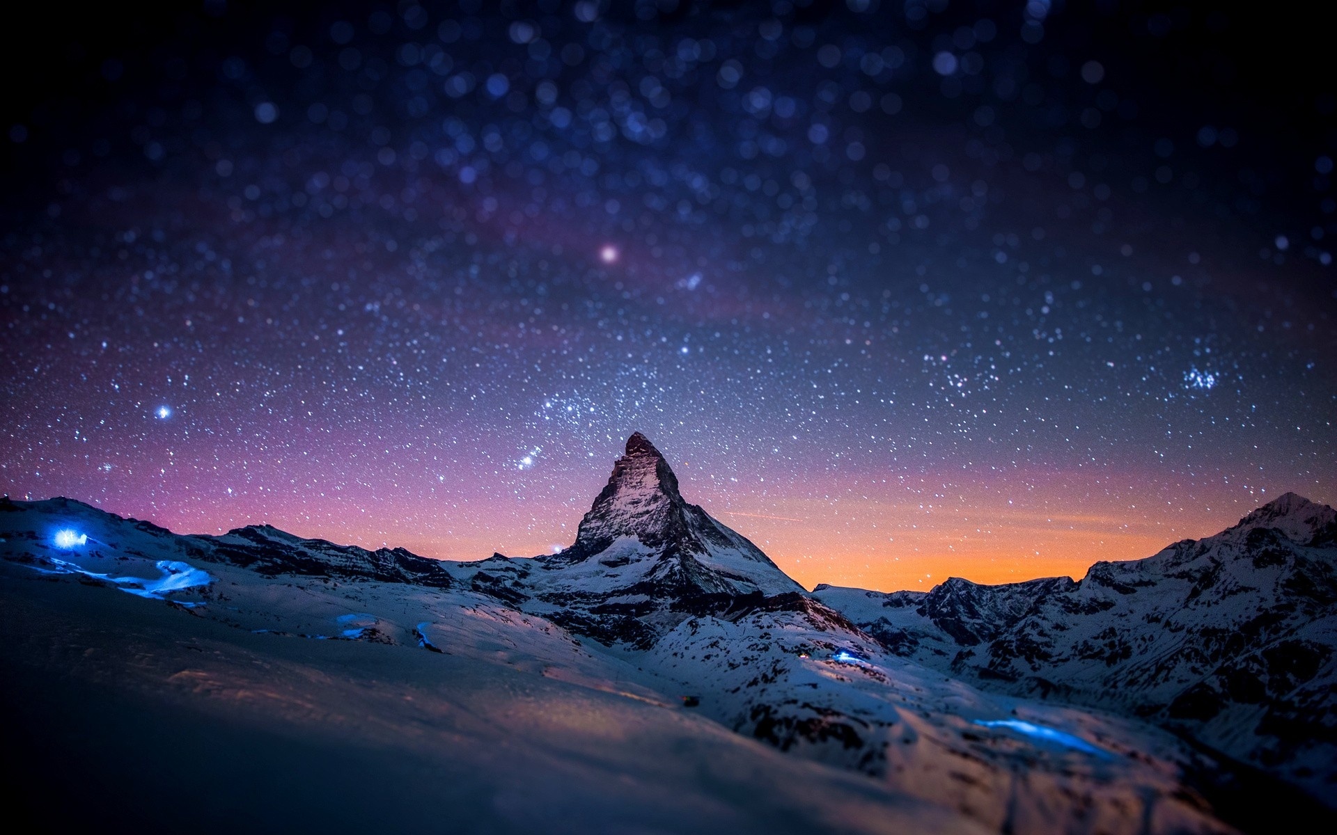 A breathtaking view of the Matterhorn under a stunning starry night sky