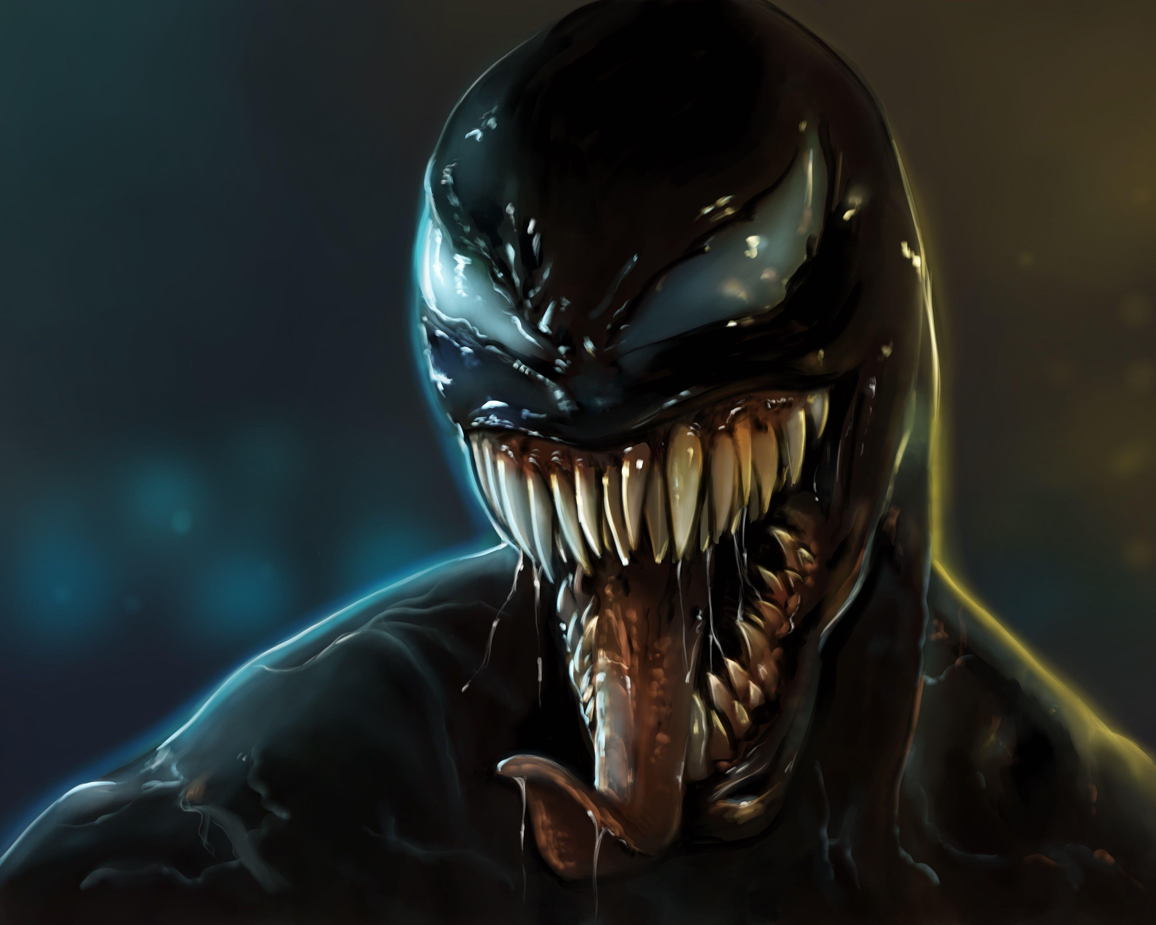 Close-up of Venom's menacing face, featuring sharp teeth, long tongue, and glowing eyes, against a dark background
