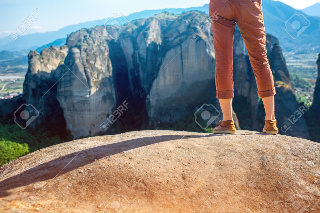 Man Standing On The Top Of Mountain Beautiful Scenic Clif