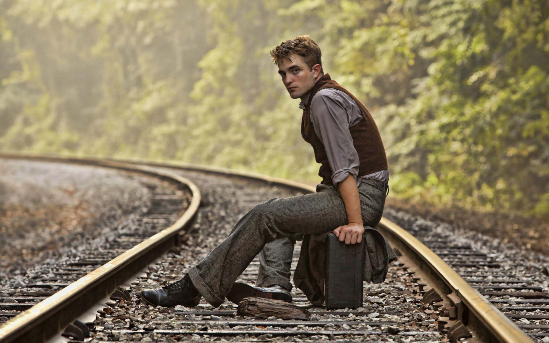 Robert Pattinson Sitting On A Railway Track HD Hollywood Actors