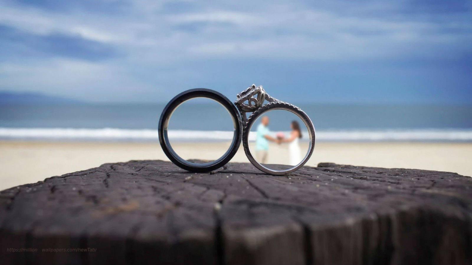 Wedding Rings On The Beach Wallpaper