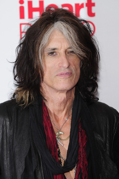 Joe Perry Poses In The Press Room At Iheartradio Music