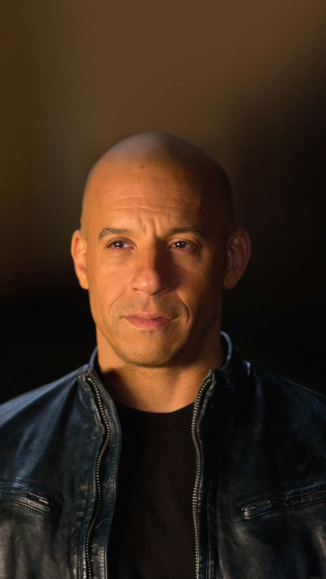 A Bald Man In Leather Jacket Wallpaper