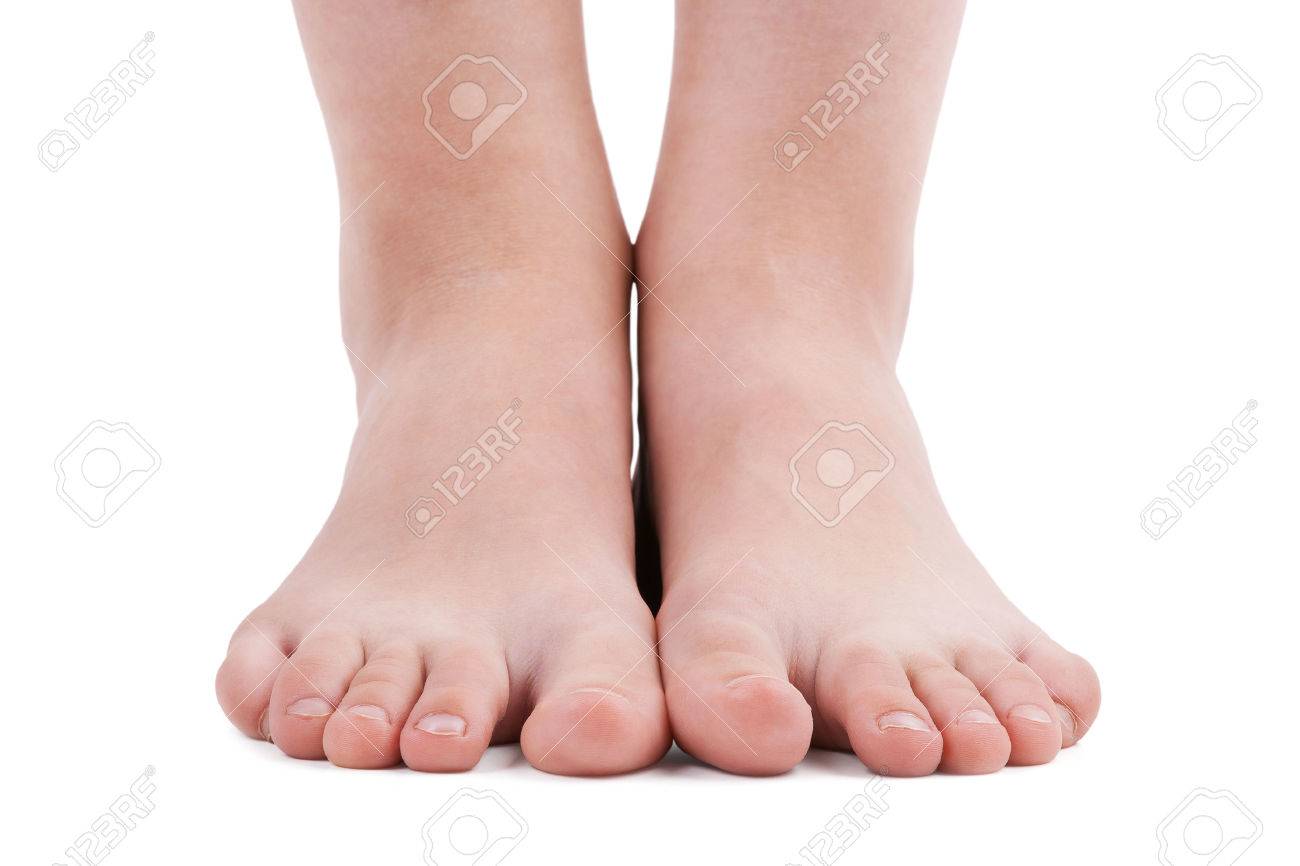 Human Feet Standing On A White Background Stock Photo Picture And