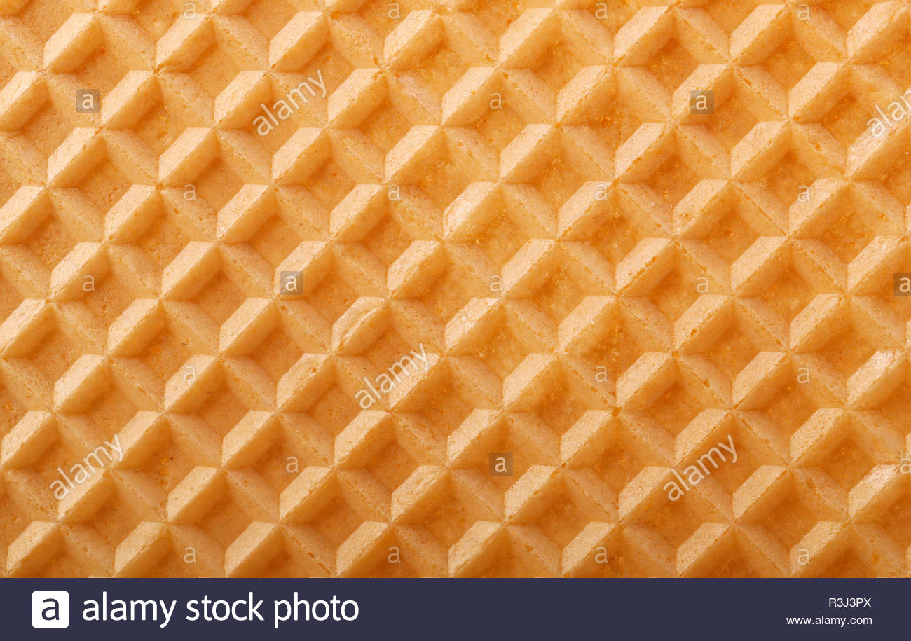 Structure Of A Golden Baked Waffle Background Stock Photo