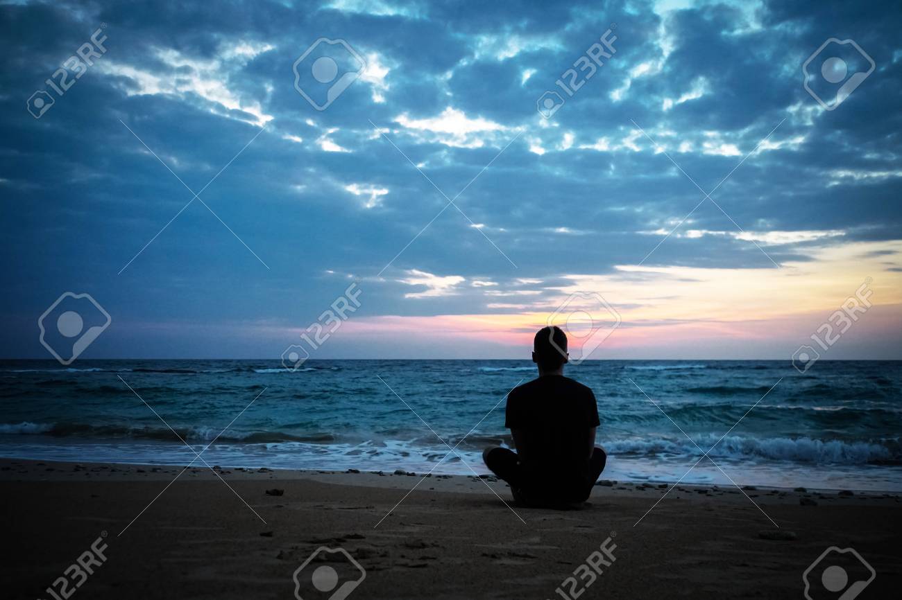 Toned Photo Of Lonely Man Sit At Sunset Background Young