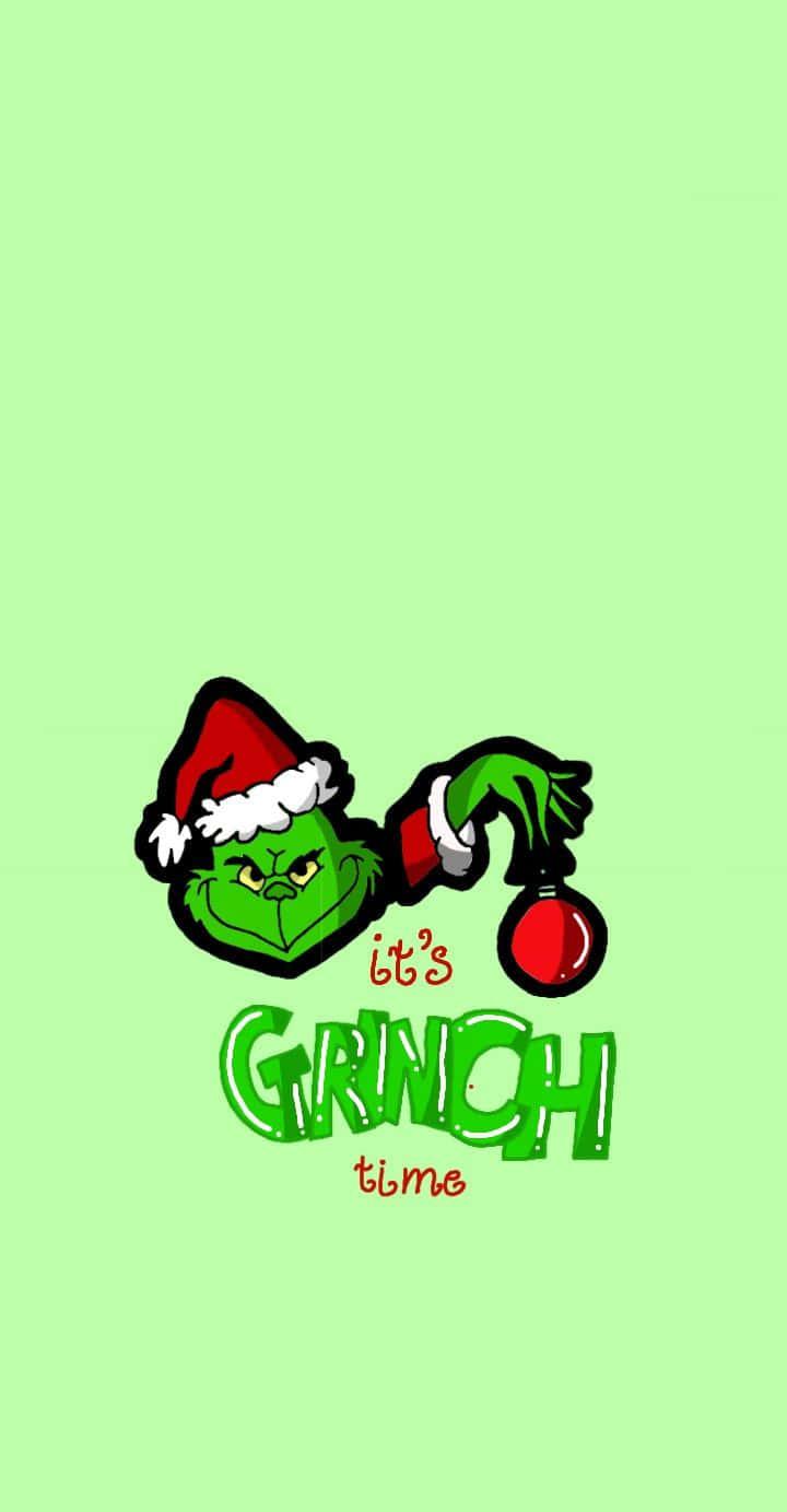 Download Bring on The Christmas Cheer with a Cute Grinch Wallpaper