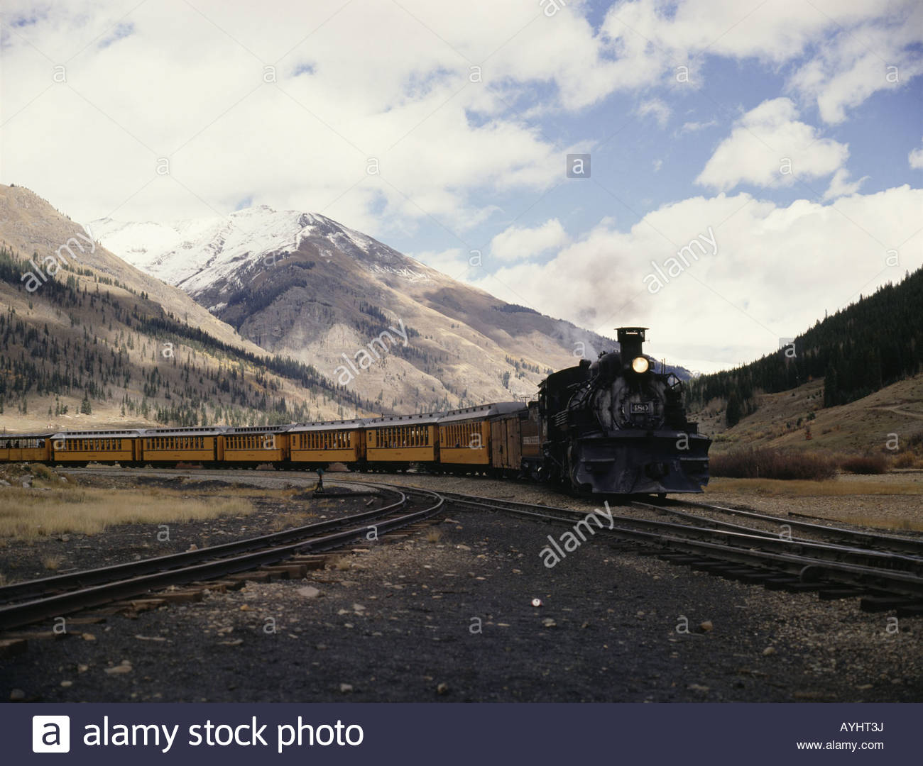 Train On Durango Silverton Railroad With Mountain Ranges In