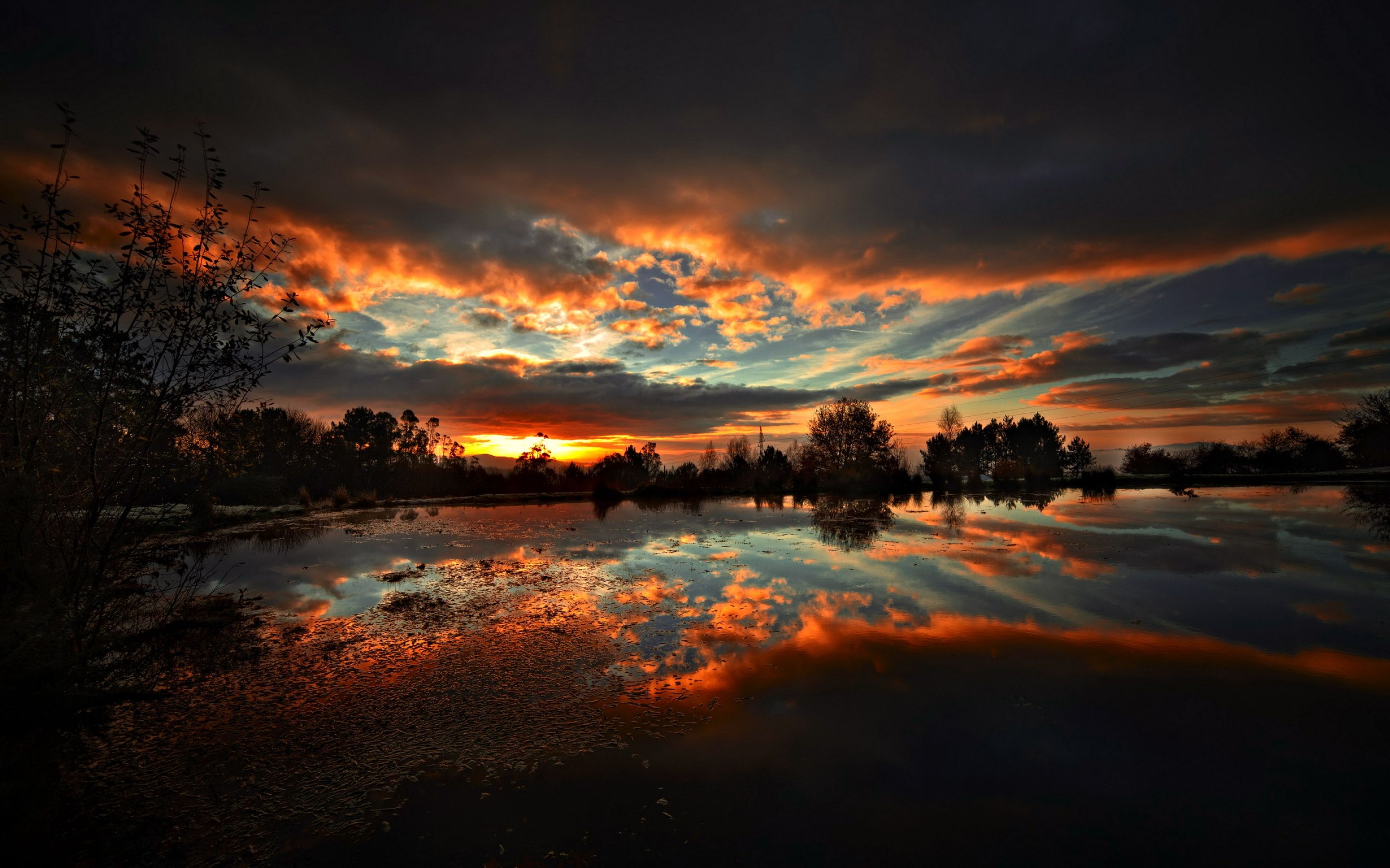 Fiery Sunset Reflecting in Calm Lake - MacBook Wallpaper