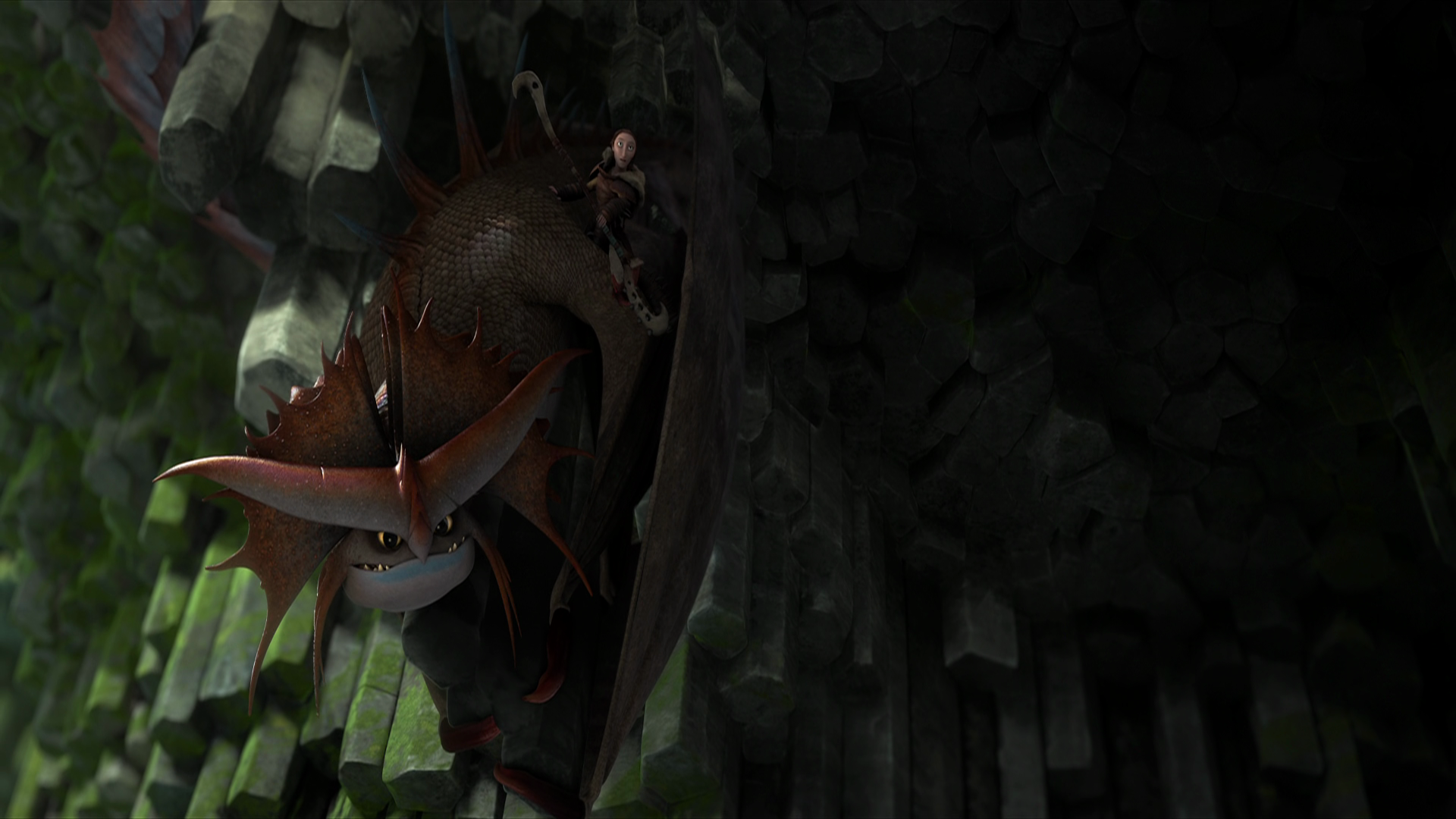 A dragon and its rider perched on a cliff face in a dimly lit cave, from the How to Train Your Dragon franchise