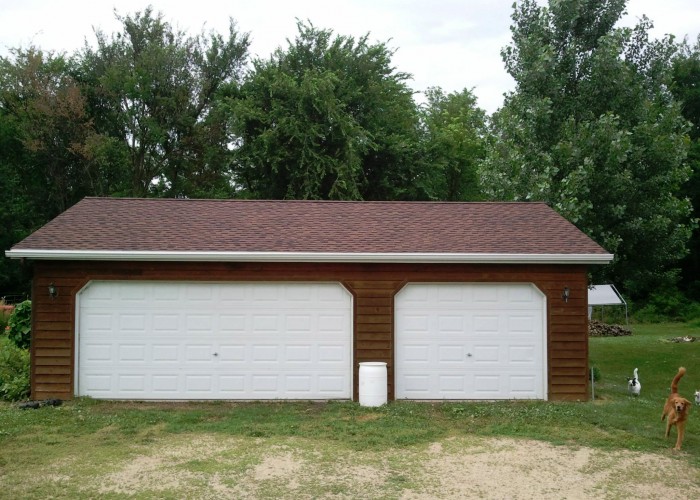 house garage roofing project by Home Improvement Specialists 700x500
